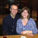 Owen and Myrna sitting at a restaurant table