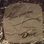 Dove chocolate wrapper saying Quote your Dad