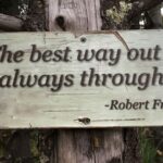 Robert Frost quote on sign